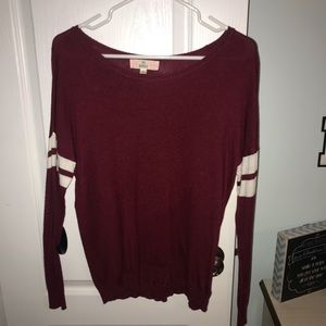 Maroon sweater with stripes on sleeves